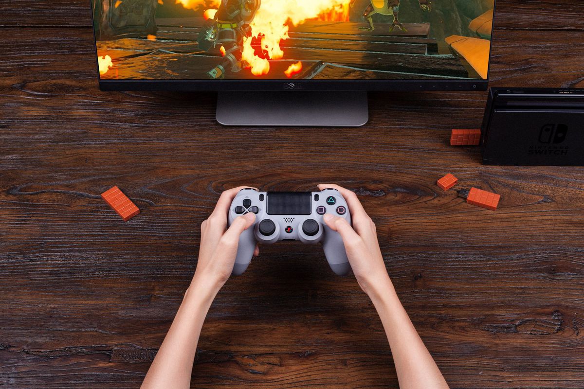 8Bitdo’s newest USB adapter can pair a PS4 controller to a Switch-Gamersrd