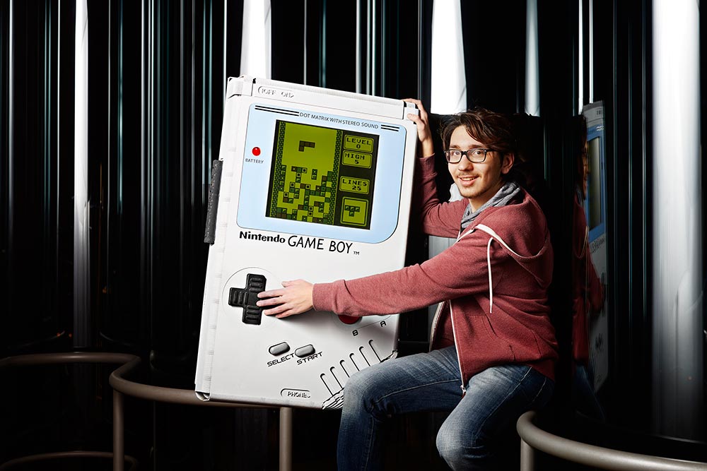 https://gamersrd.com/wp-content/uploads/2024/12/Playing-the-largest-Game-Boy_tcm55-495201.jpg