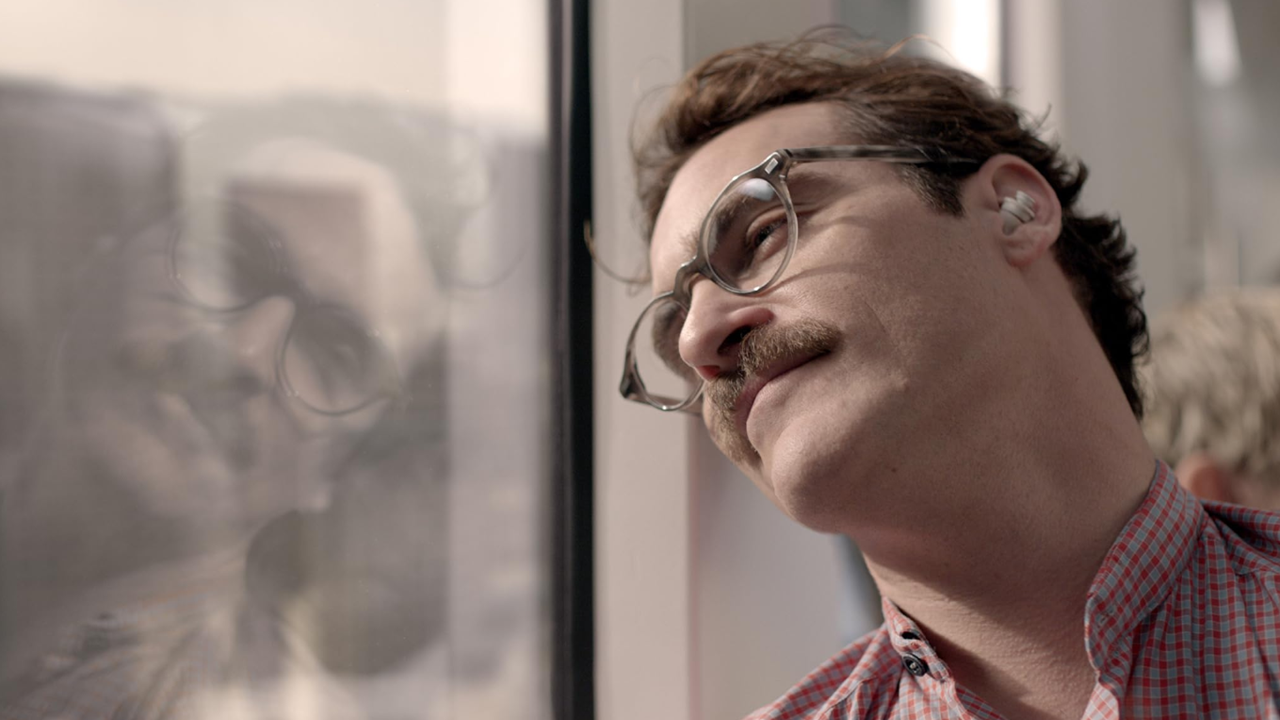 JOAQUIN PHOENIX AS THEODORE IN HER. IMAGE COURTESY OF WARNER BROS. PICTURES.