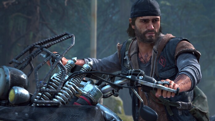 Days Gone 2 y el cooperativo que nunca llegó Deacon St. John en una escena de Days Gone junto a la representación del modo cooperativo cancelado